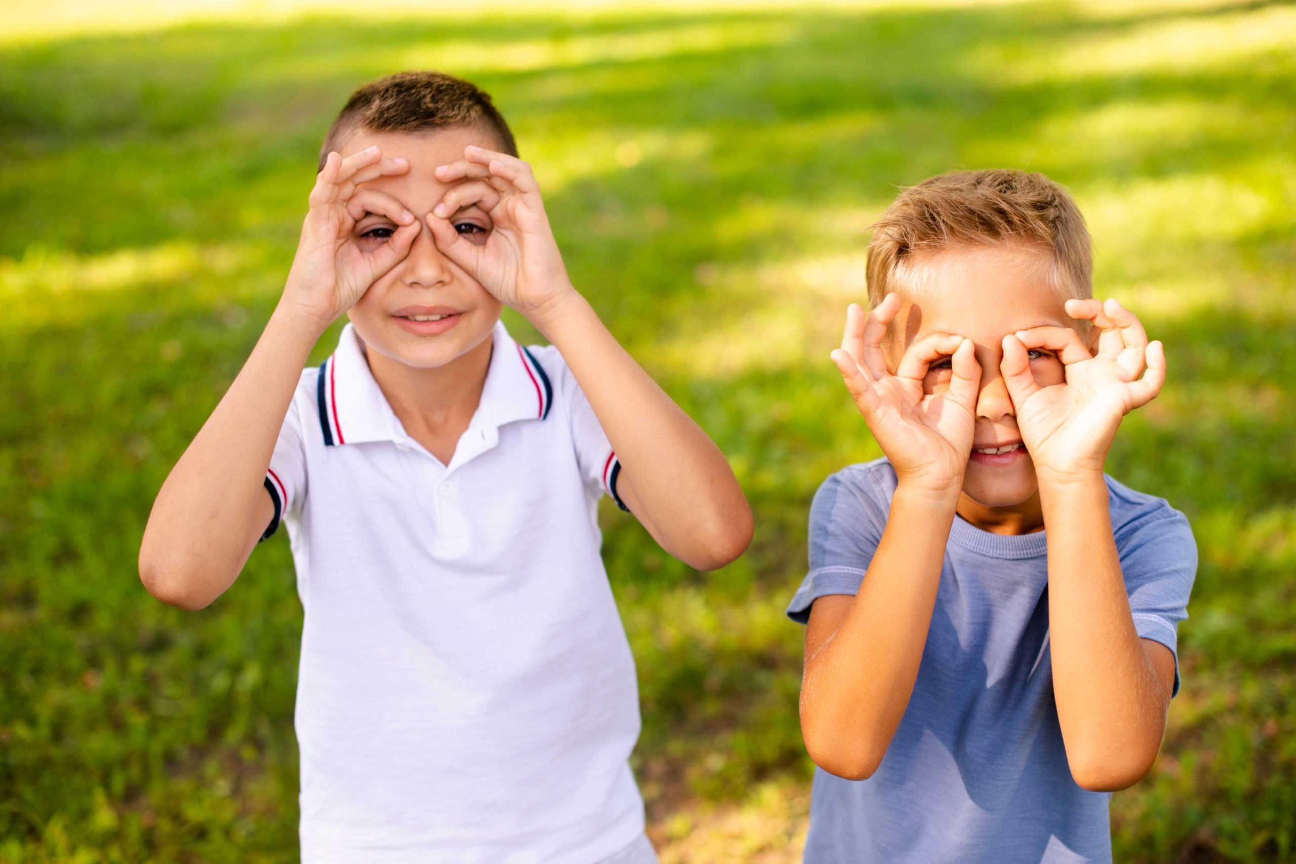 jpeg optimizer little boys making fake glasses with their fingers scaled